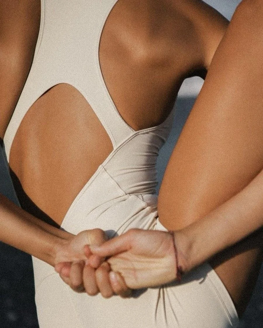 Two people holding hands